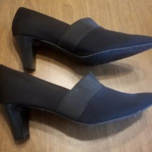 Coach and four black heels